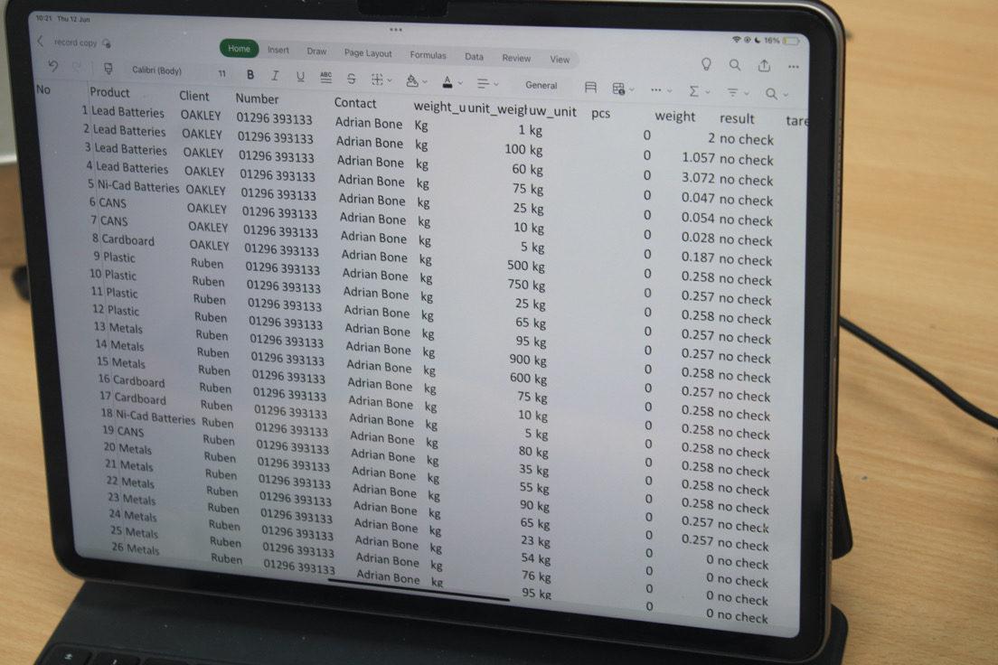 Laptop displaying a waste management log with item names, client details, weights, and timestamps in a tabular list